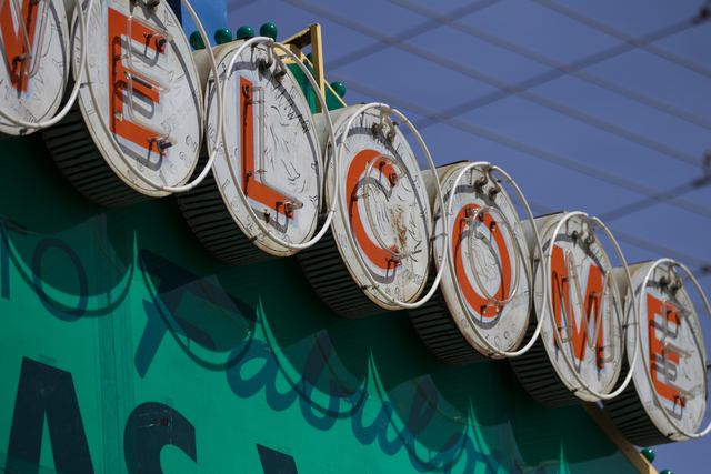 Iconic Las Vegas sign showing signs of wear and tear